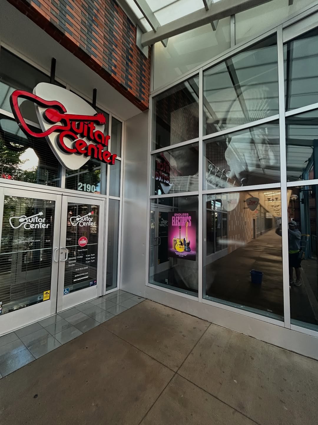 Commercial storefront window and facade pressure washing