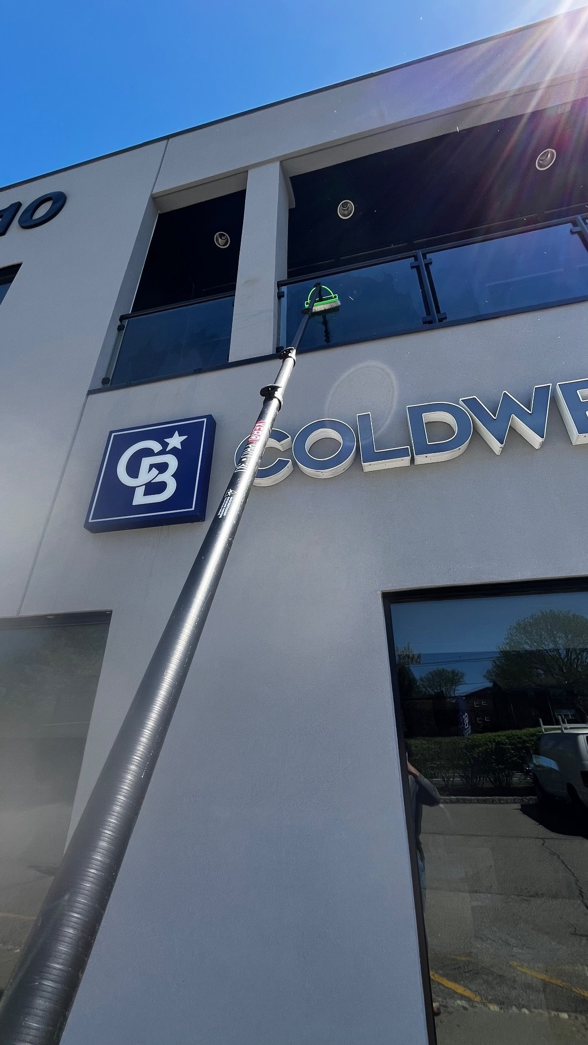 Streak free commercial window cleaning at a Coldwell Banker office in Wayne NJ