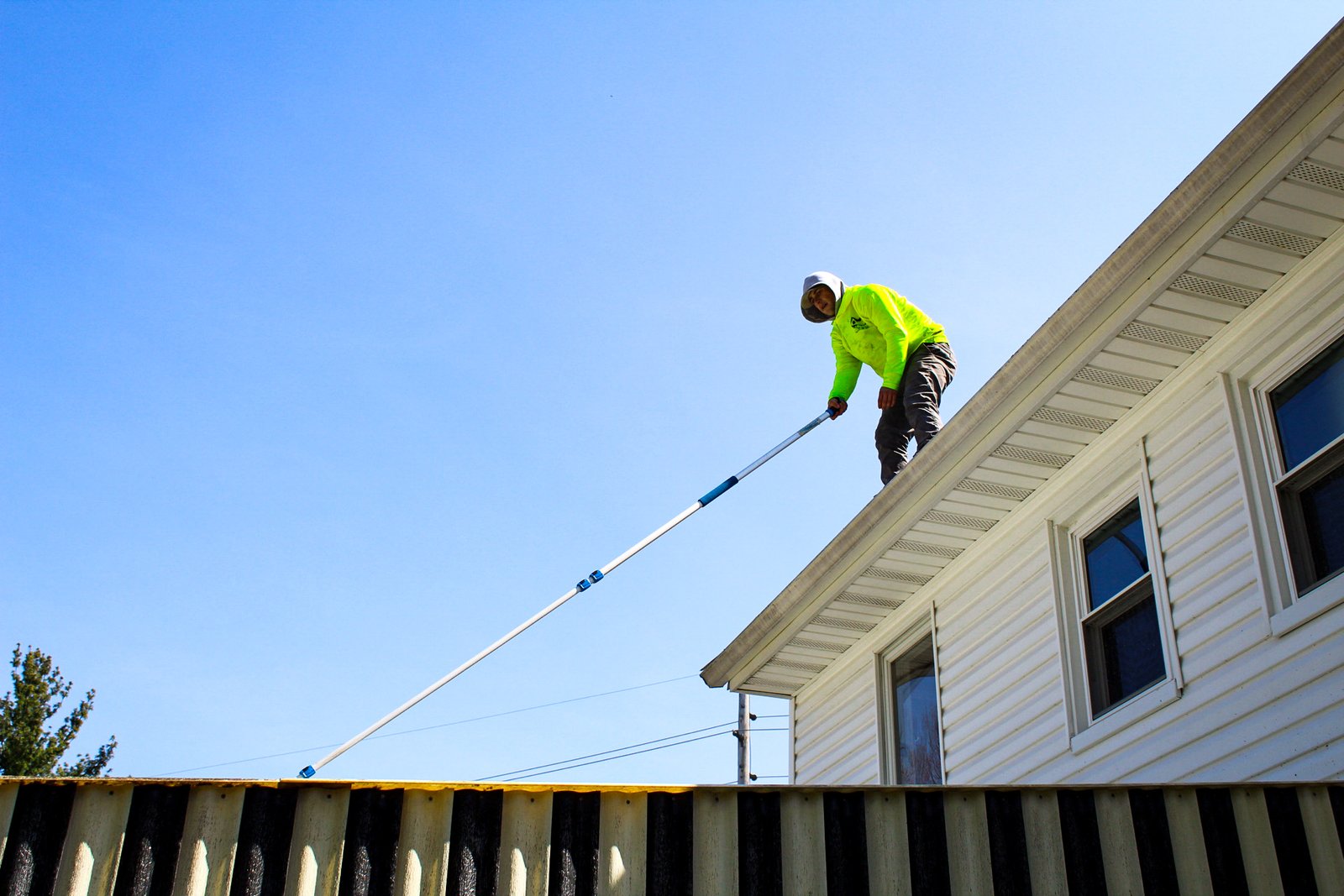 Roof soft washing in progress on a North Jersey home
